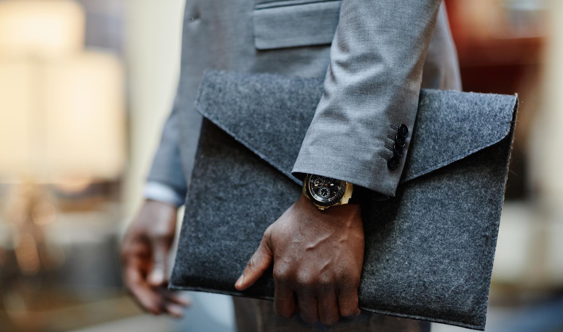 Settle into comfort at Trellis House a person holding documents