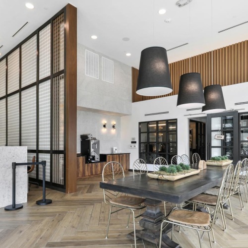 Settle into comfort at Trellis House a room with a table and chairs