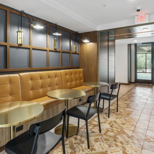 Find your perfect fit at Trellis House a room with tables and chairs