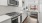a kitchen with white cabinets