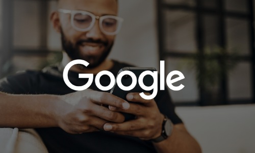 Google man looking at phone